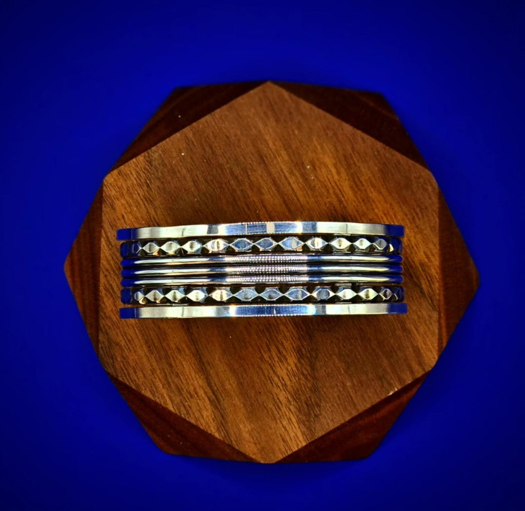 5 band sterling silver cuff made with pattern wire and an oxidized finish.