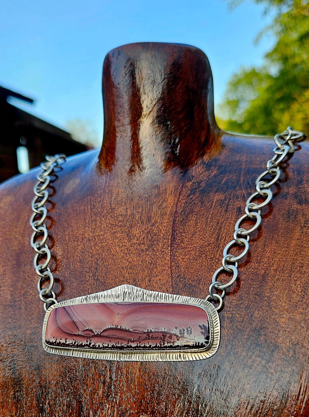 Rectangular Apache Sage rhyolite Pendant set in sterling silver with an 16 inch handmade chain. Pink sunset desert scene.