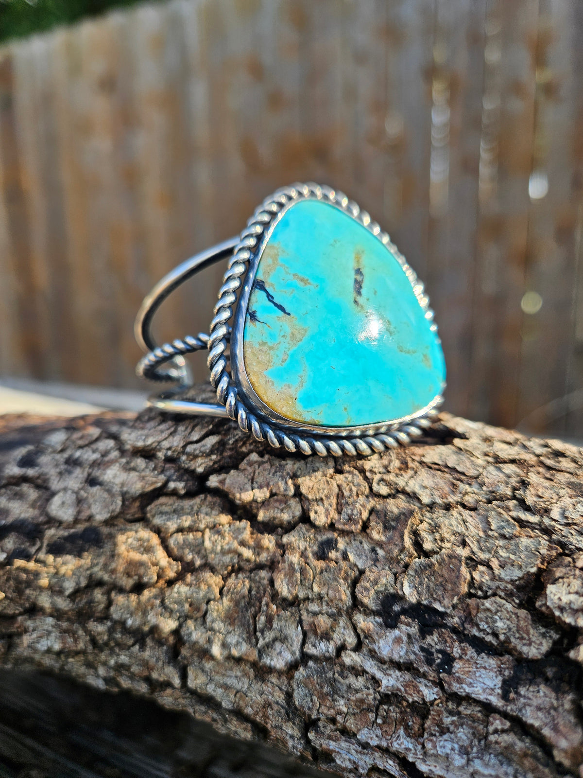 Big Turquoise #8 Cuff set in sterling silver with a dark patina finish and three bands.