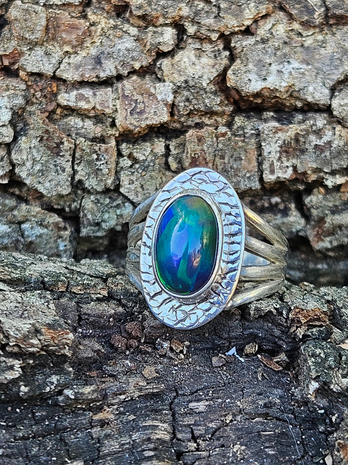  Shop our handcrafted Abyssal Fire Ring. Featuring a natural black Ethiopian opal with 3D neon green & blue fire set in a rustic