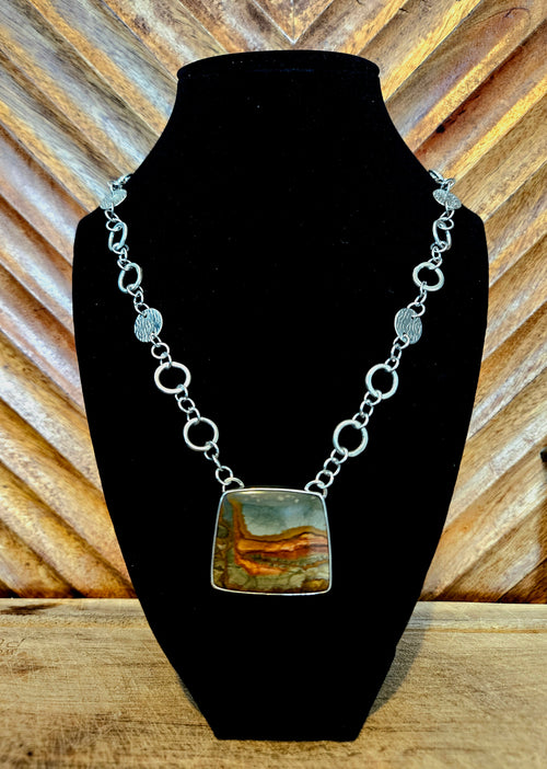 Owyhee Blue Sky Picture Jasper Pendant set in sterling siñver with a handmade silver chain. 