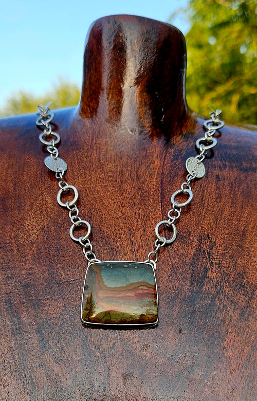 Owyhee Blue Sky Picture Jasper Pendant set in sterling silver with a handmade silver chain.