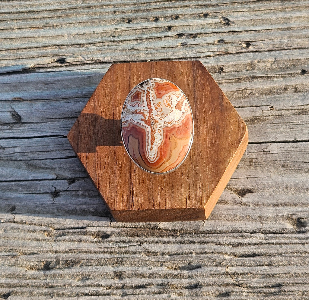 Large oval shaped crazy lace agate ring set in sterling silver deco ring. Size 8.75