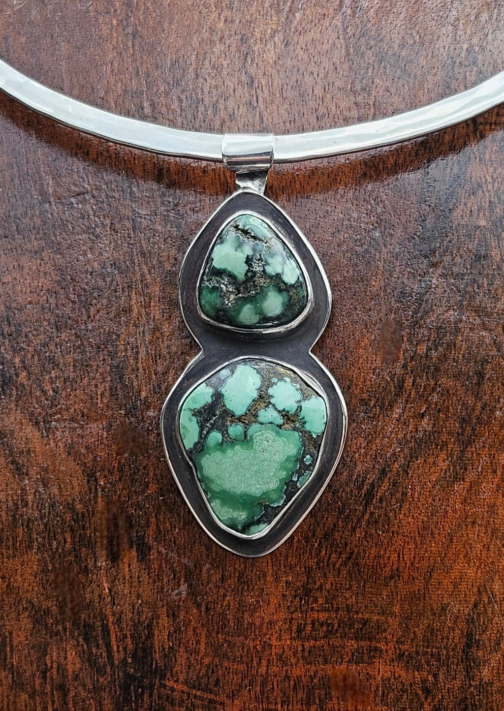 Double Damele Turquoise Pendant in Sterling Silver with an Oxidized Finish. Forest green and black matrix.