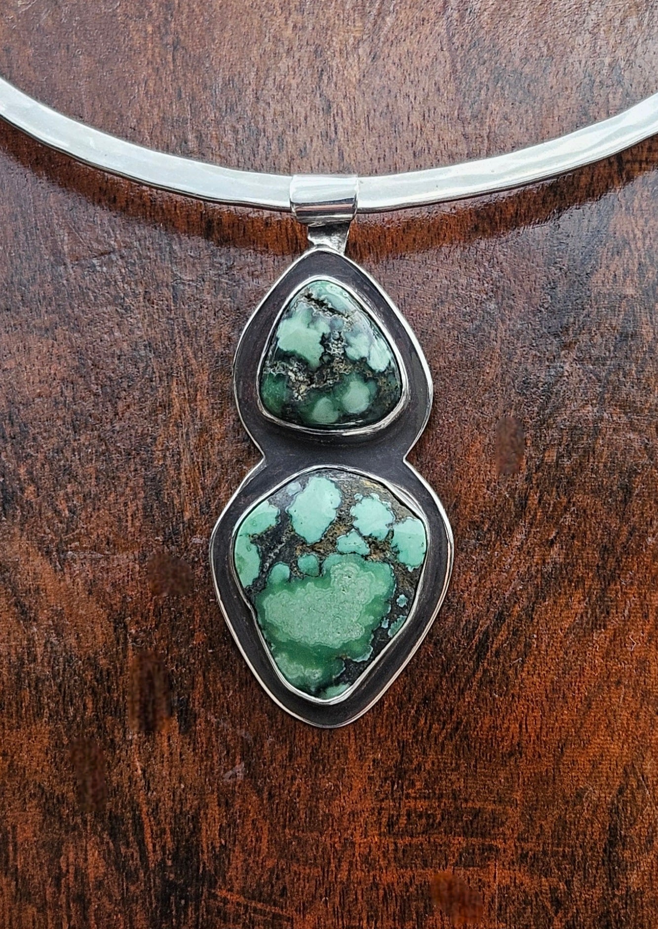 Double Damele Turquoise Pendant in Sterling Silver with an Oxidized Finish. Forest green and black matrix.