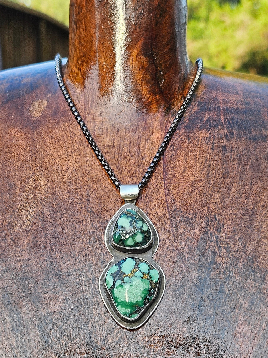 Double Damele Turquoise Pendant in Sterling Silver with an Oxidized Finish. Forest green and black matrix.