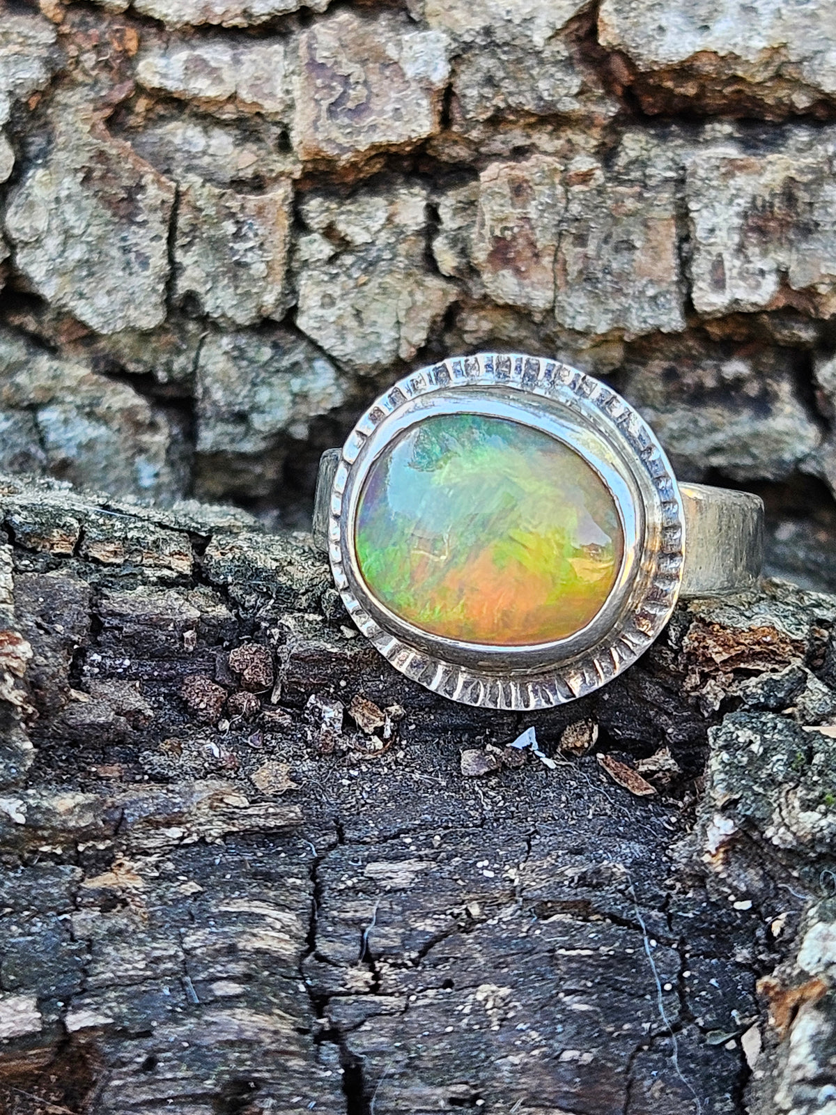 Ethiopian Opal Ring set in sterling silver. Size 7. Welo Opal. Play of colors