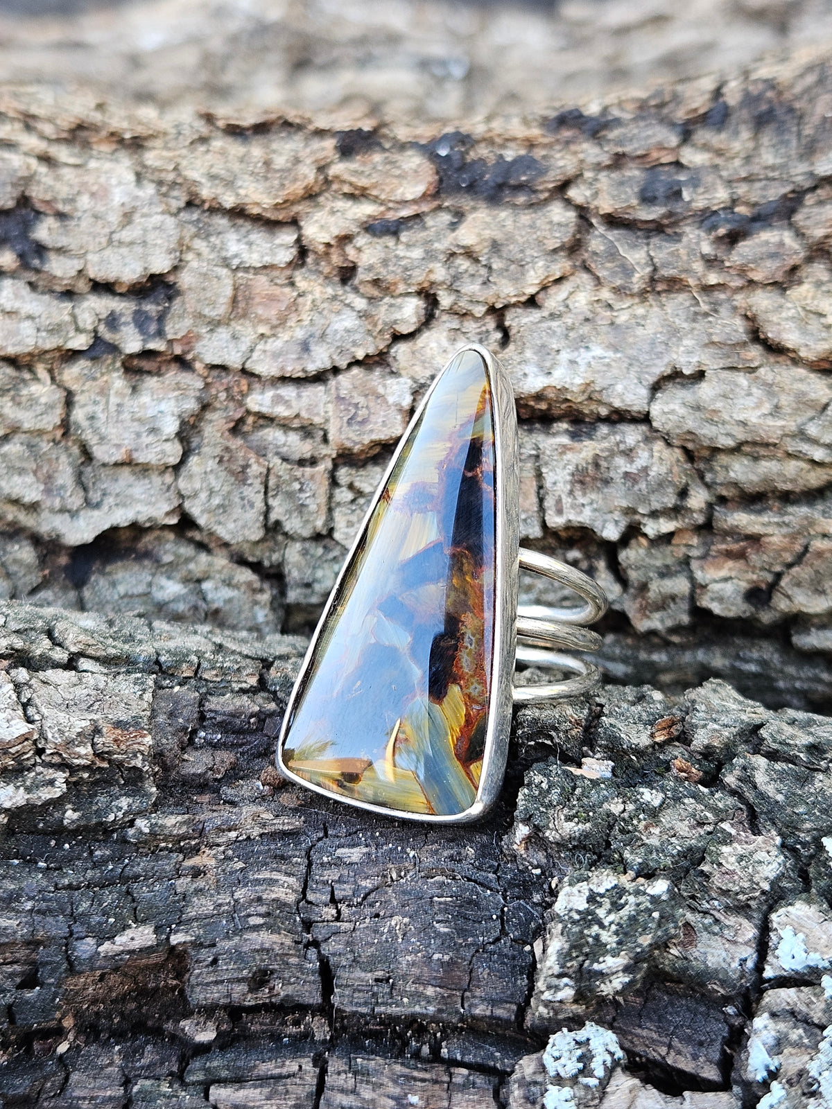 Triangular Shaped Golden Brown Pietersite Ring set in sterling silver. Size 9