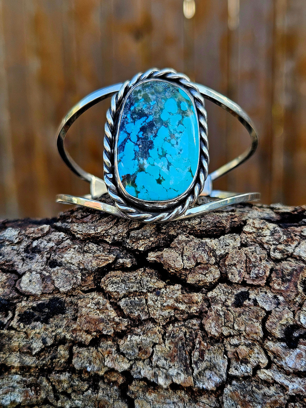 Sterling Silver Kingman Turqouise witj black matrix Cuff with two bands and a rope border.
