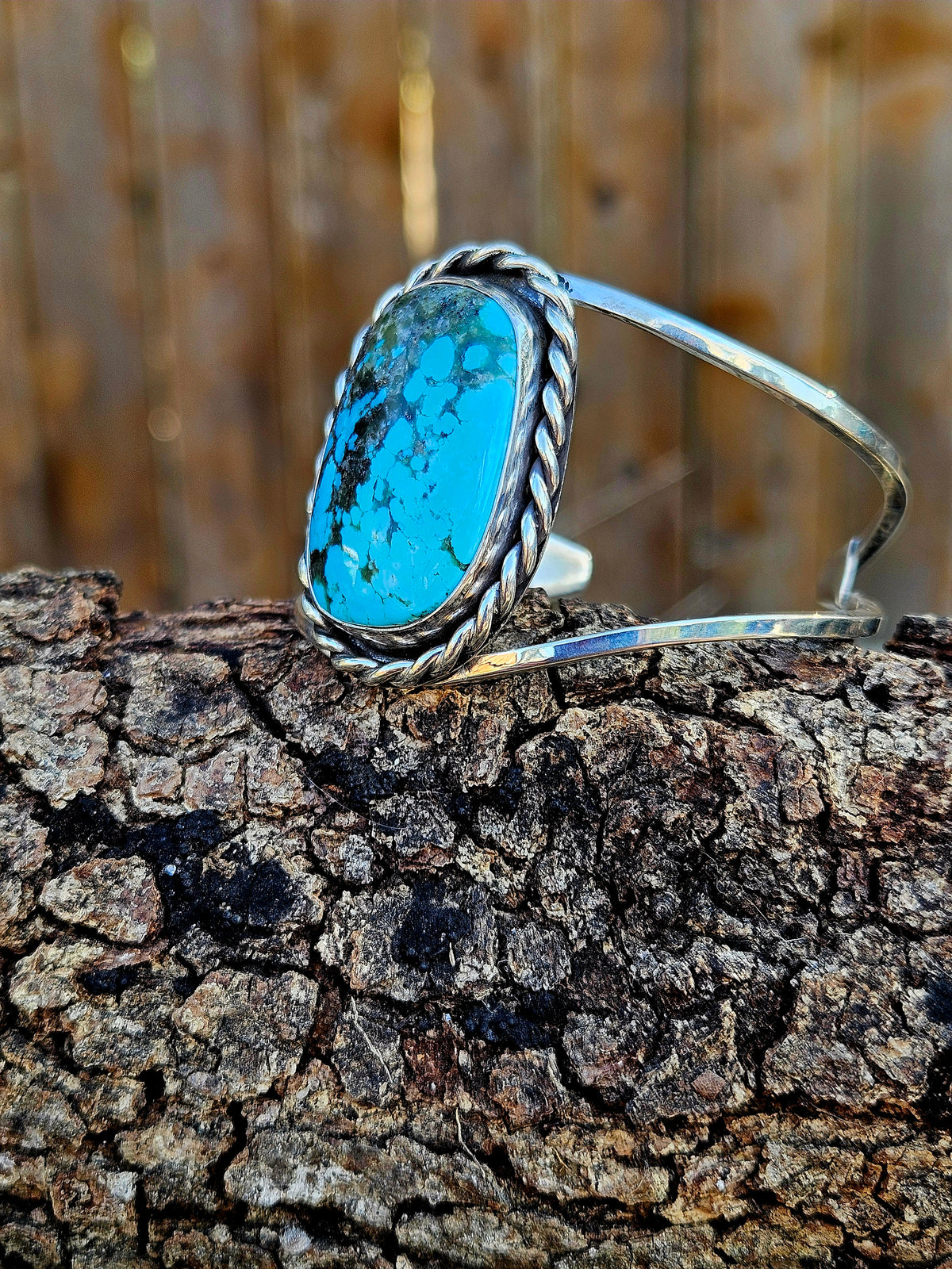 Sterling Silver Kingman Turqouise with black matrix Cuff with two bands and a rope border.