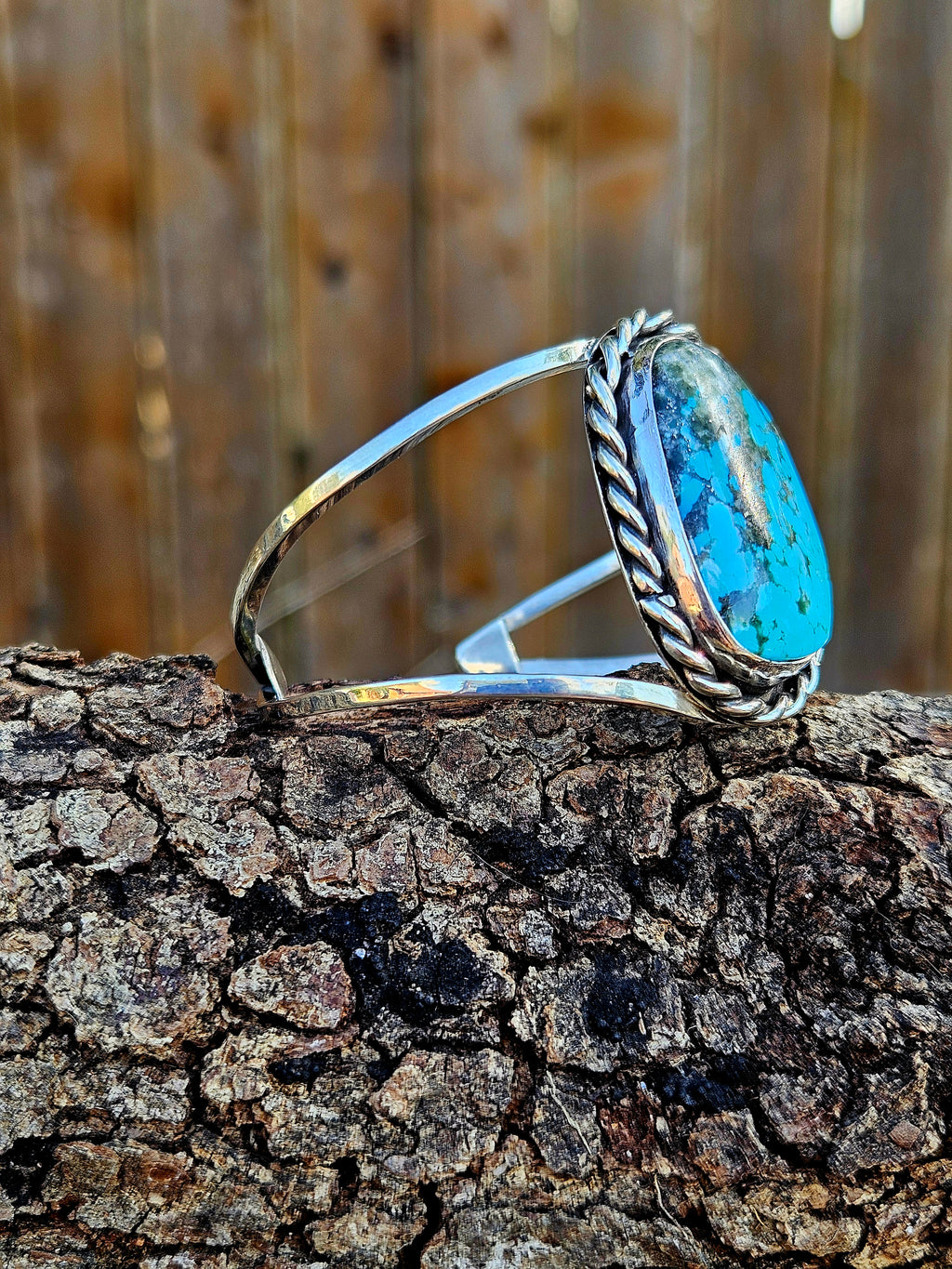 Sterling Silver Kingman Turqouise with black matrix Cuff with two bands and a rope border.