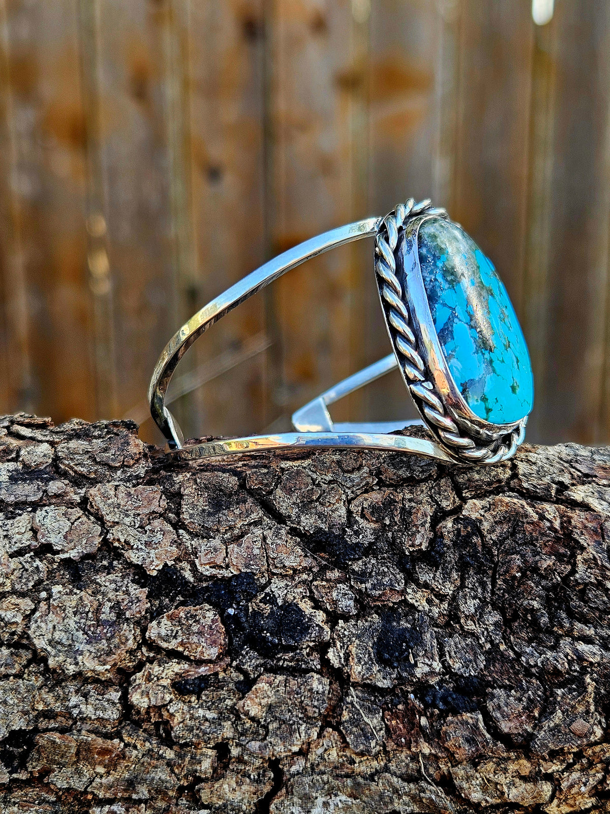 Sterling Silver Kingman Turqouise with black matrix Cuff with two bands and a rope border.