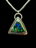 Triangular shaped Malachite Azurite Pendant set in sterling silver with a textured border. Green and blue colors.