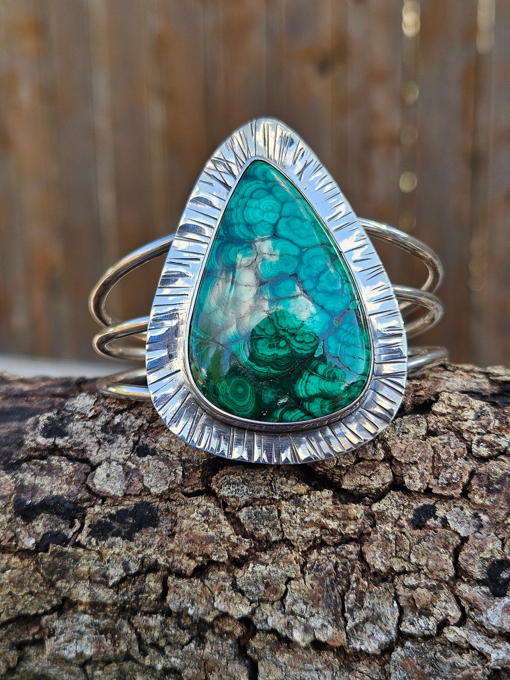 Large teardrop shaped malachite cabachon bracelet set in sterling silver