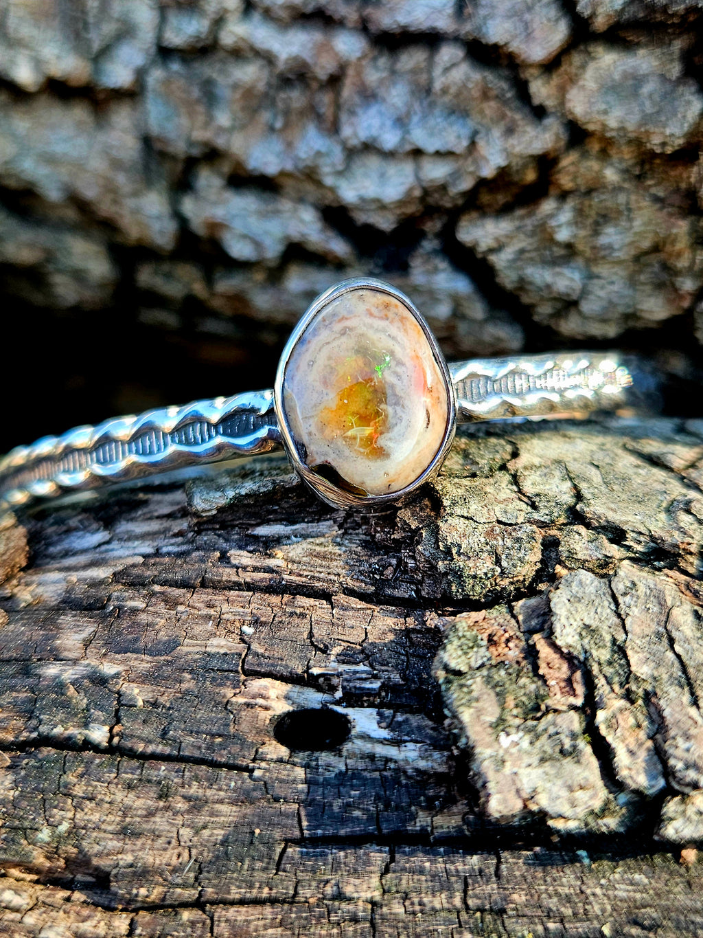 Sterling Silver Mexican Opal bracelet with silver pattern wire.
