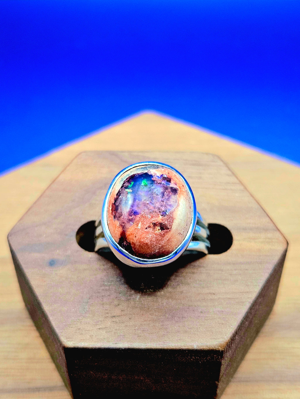 Mexican matrix opal ring set in sterling silver with purple, blue and green colors. Size 6.25