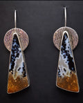 Triangular Shaped Petrified Palm Wood Earrings set in sterling silver with a textured circular backplate. Dangle earrings. Multi color, black, white, and amber.