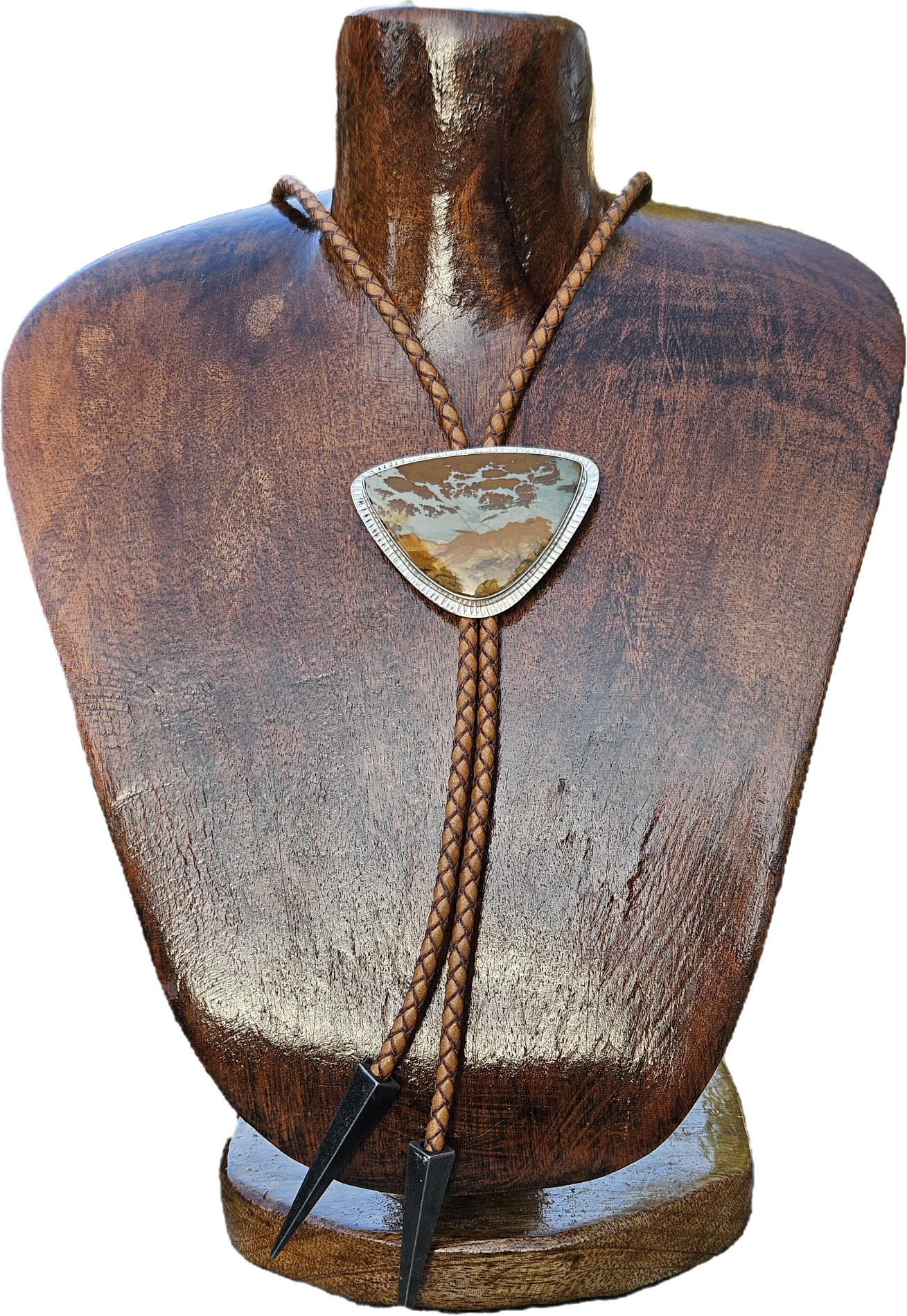 Owyhee Blue Sky Picture Jasper Bolo set in sterling silver with a textured border on a light brown leather cord with triangular antique silver tips