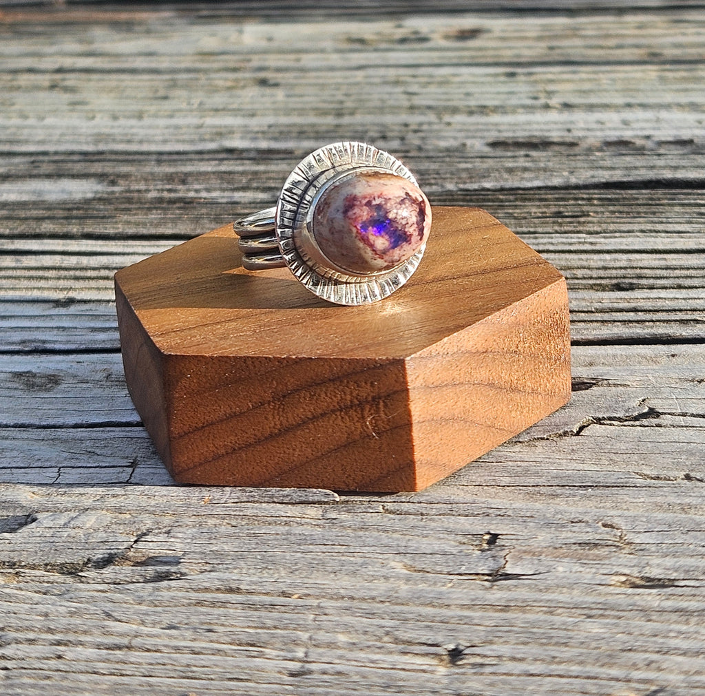Tall Mexican Matrix Opal set in sterling silver with a textured back plate on our Rising Sun band. Size 10
