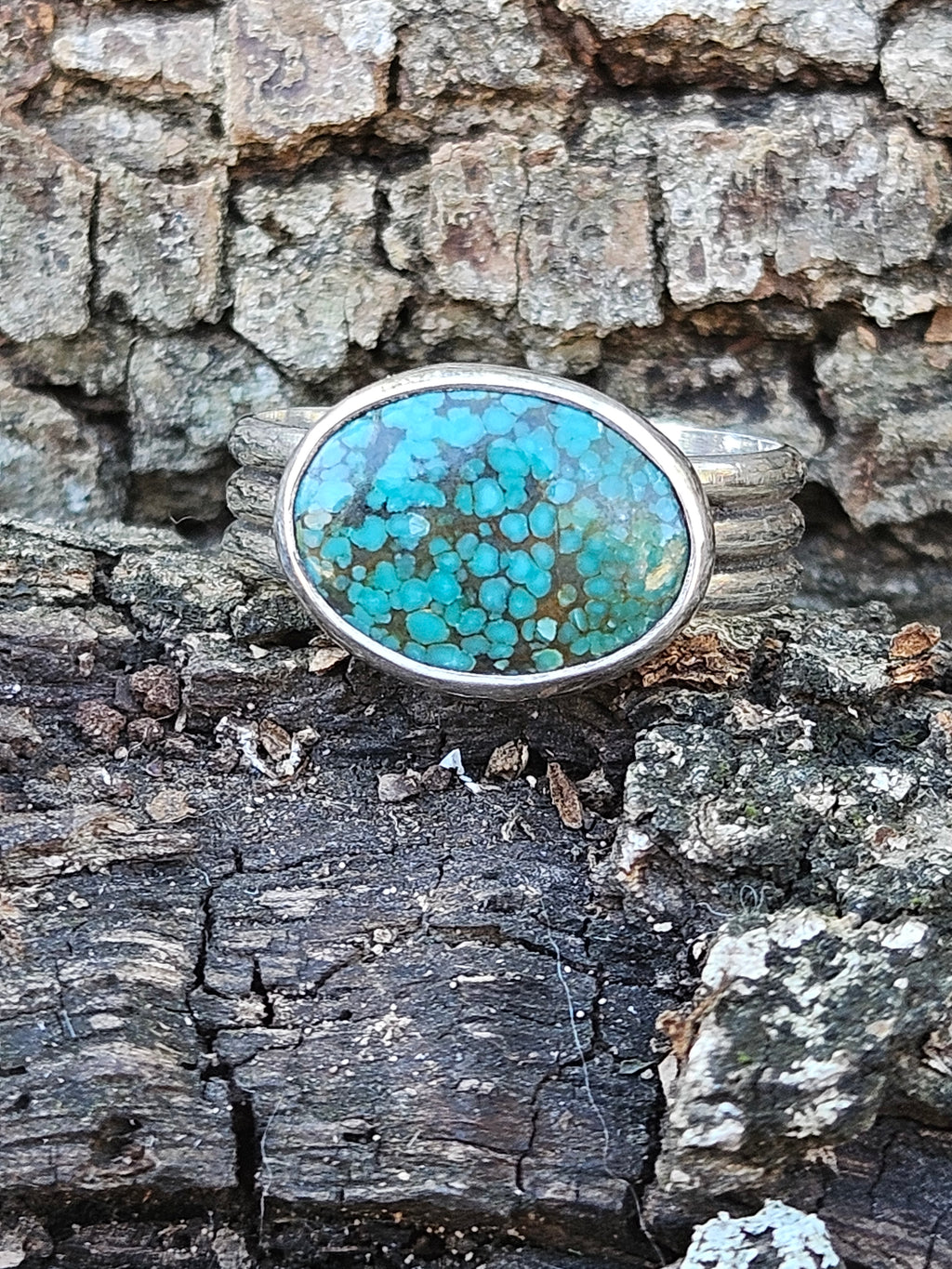 Oval shaped Hubei Spideweb Turquoise Ring set in sterling silver. Size 12