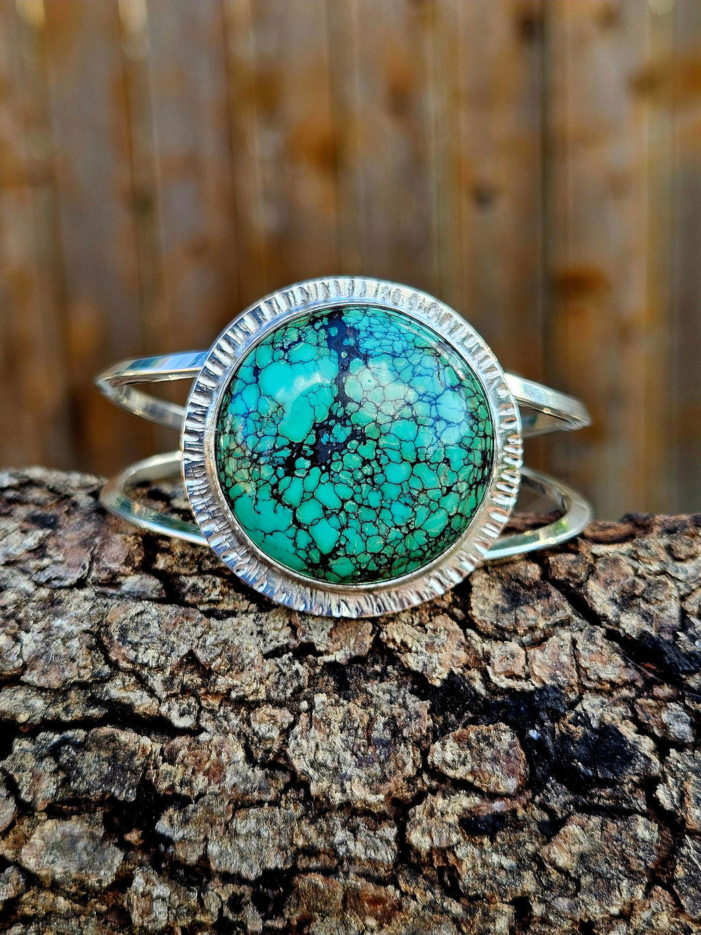 Round Hubei Spiderweb Turquoise Bracelet set in sterling silver with a textured border and 2 bands 