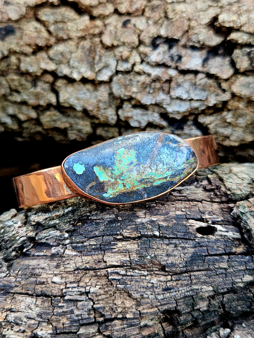Black Jack Turquoise Copper Bracelet with a hammered finish.