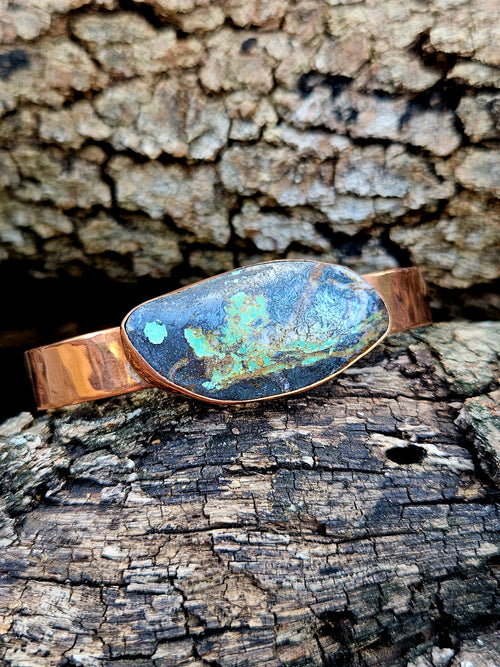 Black Jack Turquoise Copper Bracelet with a hammered finish.