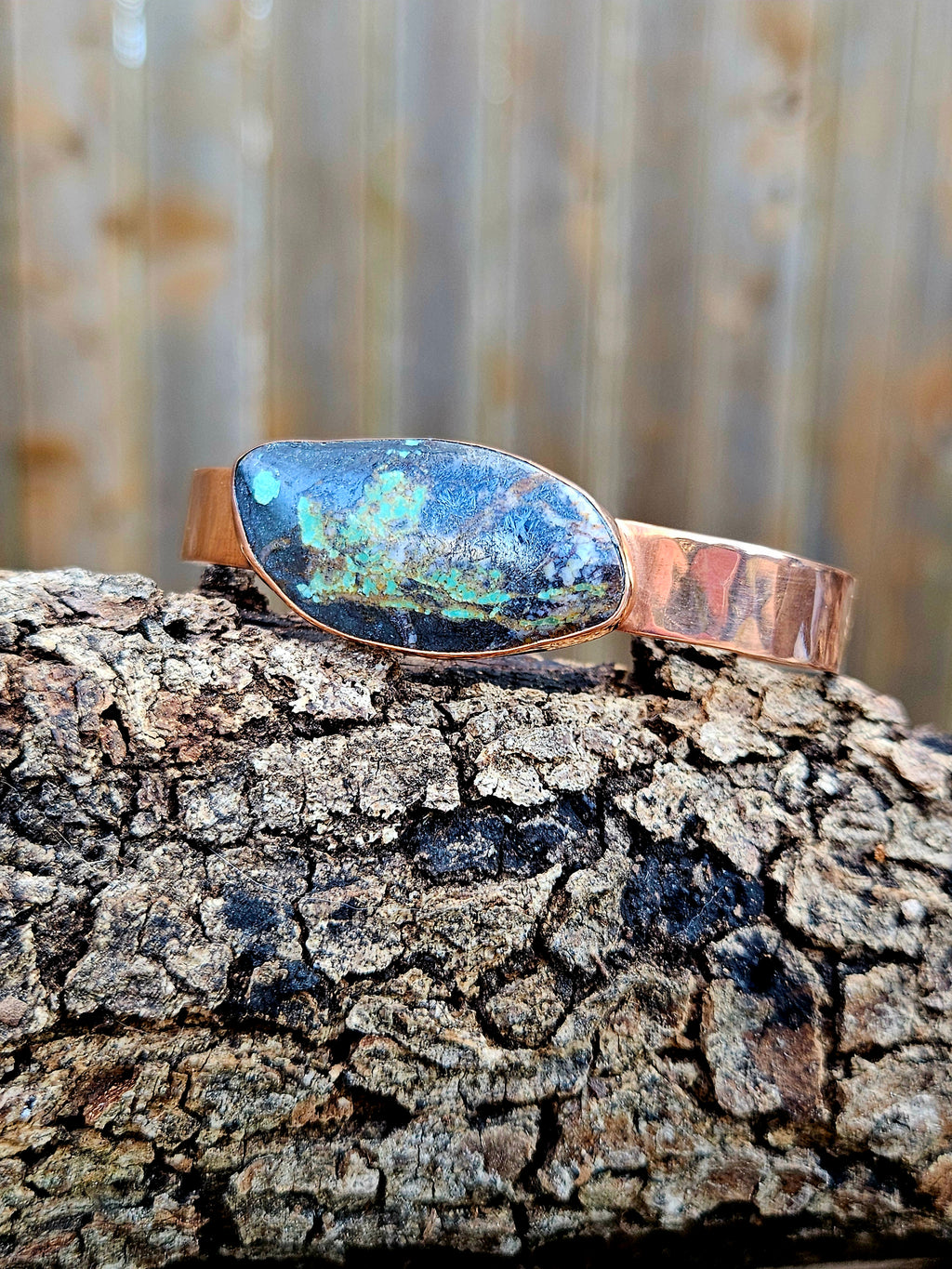 Black Jack Turquoise Copper Bracelet with a hammered finish.