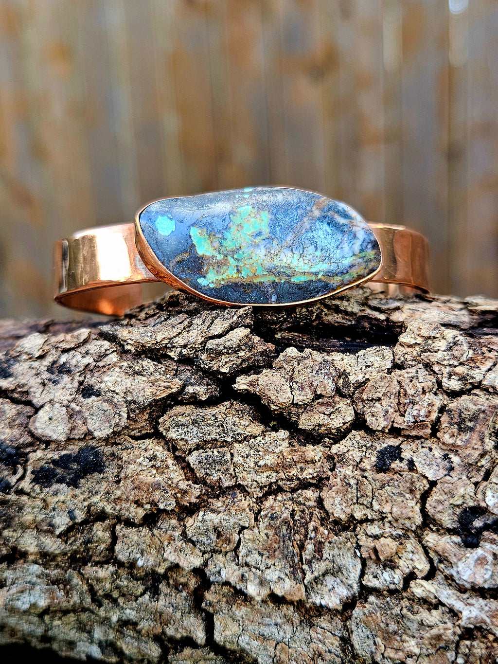 Black Jack Turquoise Copper Bracelet with a hammered finish.