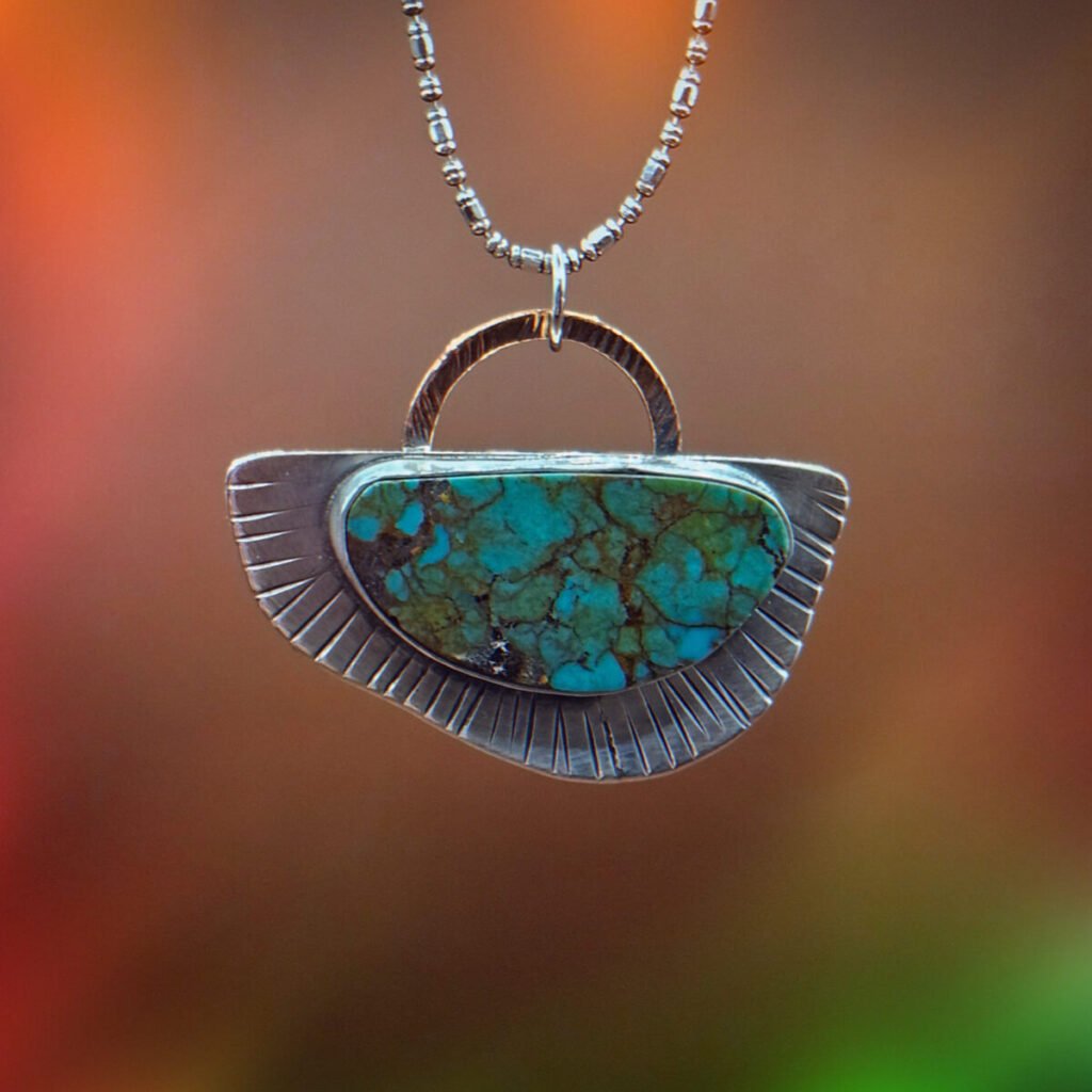 Sterling Silver Turquoise Pendant with Copper Accent
